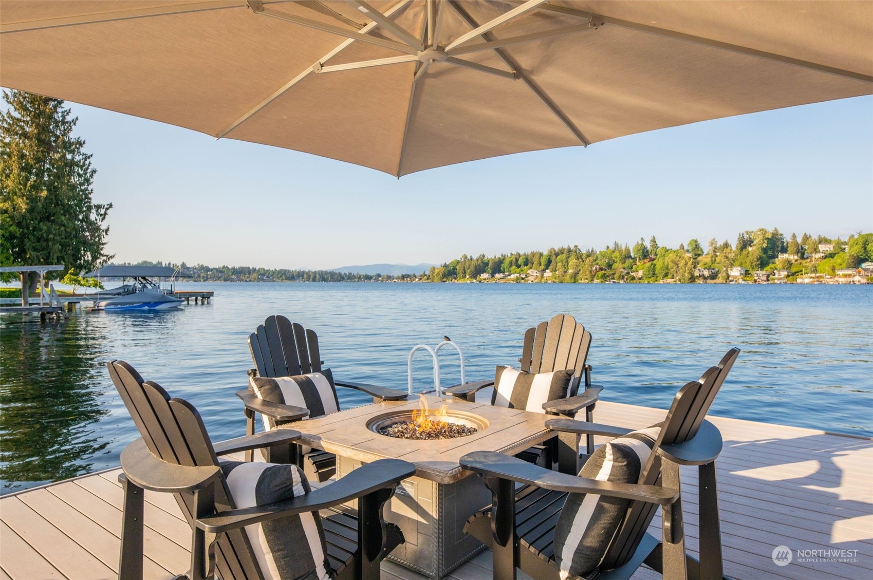 809 Stitch Road Lake Stevens, WA 98258 - Photo 4 of 40 a view of a lake with table and chairs