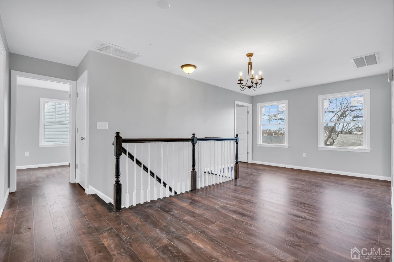 12 Fairfax Road Edison, NJ 08817 - Photo 17 of 30 a view of an entryway with wooden floor and a window