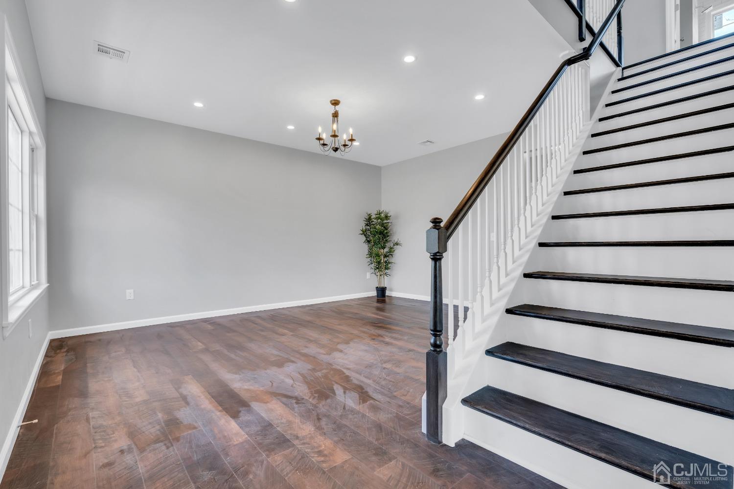 12 Fairfax Road Edison, NJ 08817 - Photo 4 of 30 a view of entryway with wooden floor