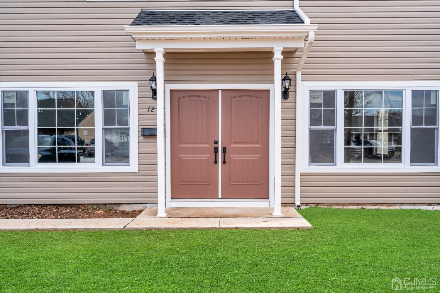 12 Fairfax Road Edison, NJ 08817 - Photo 5 of 30 a front view of a house with a yard