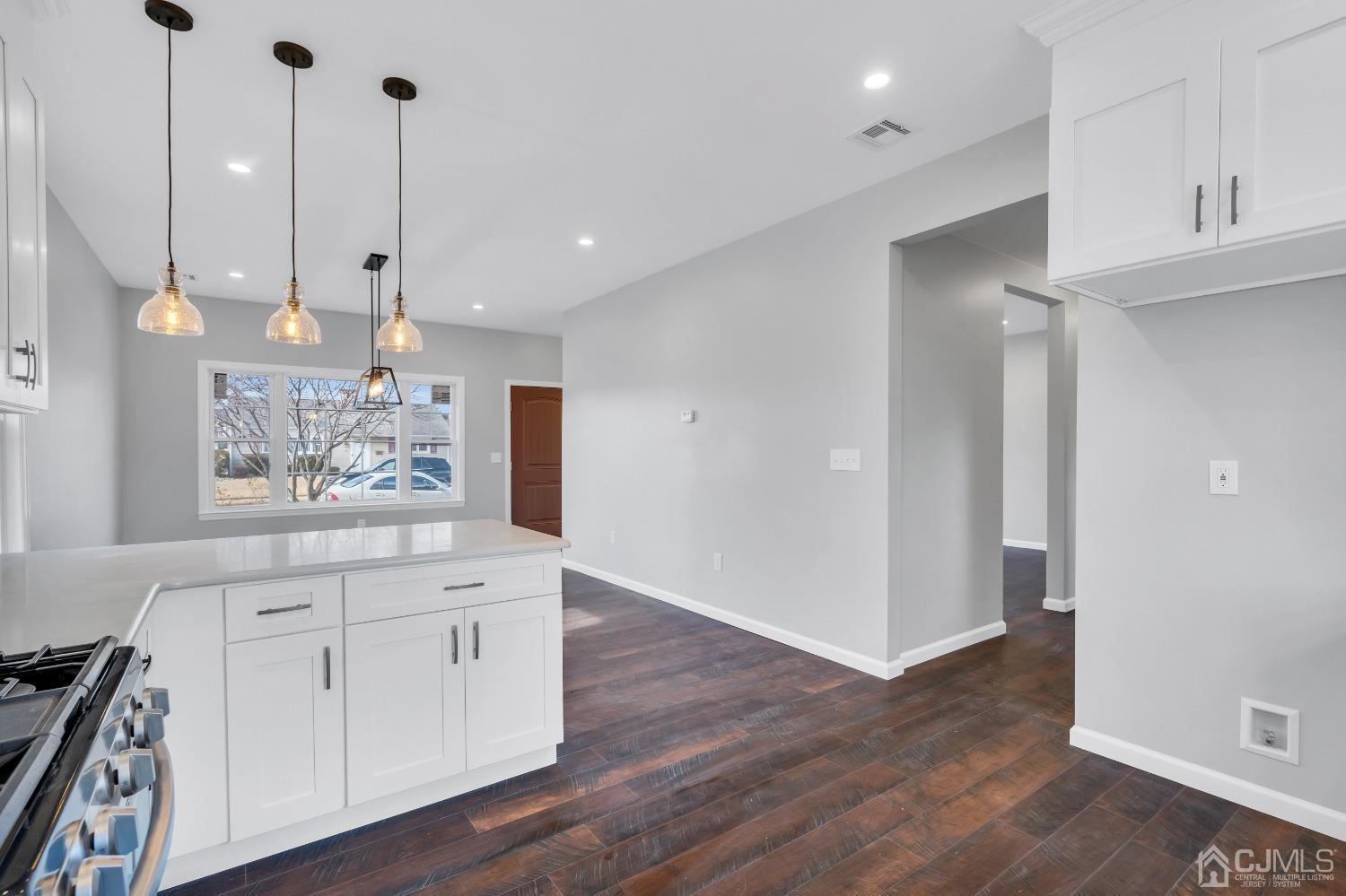 12 Fairfax Road Edison, NJ 08817 - Photo 10 of 30 a view of a kitchen with wooden floor