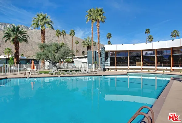 a view of a house with a swimming pool
