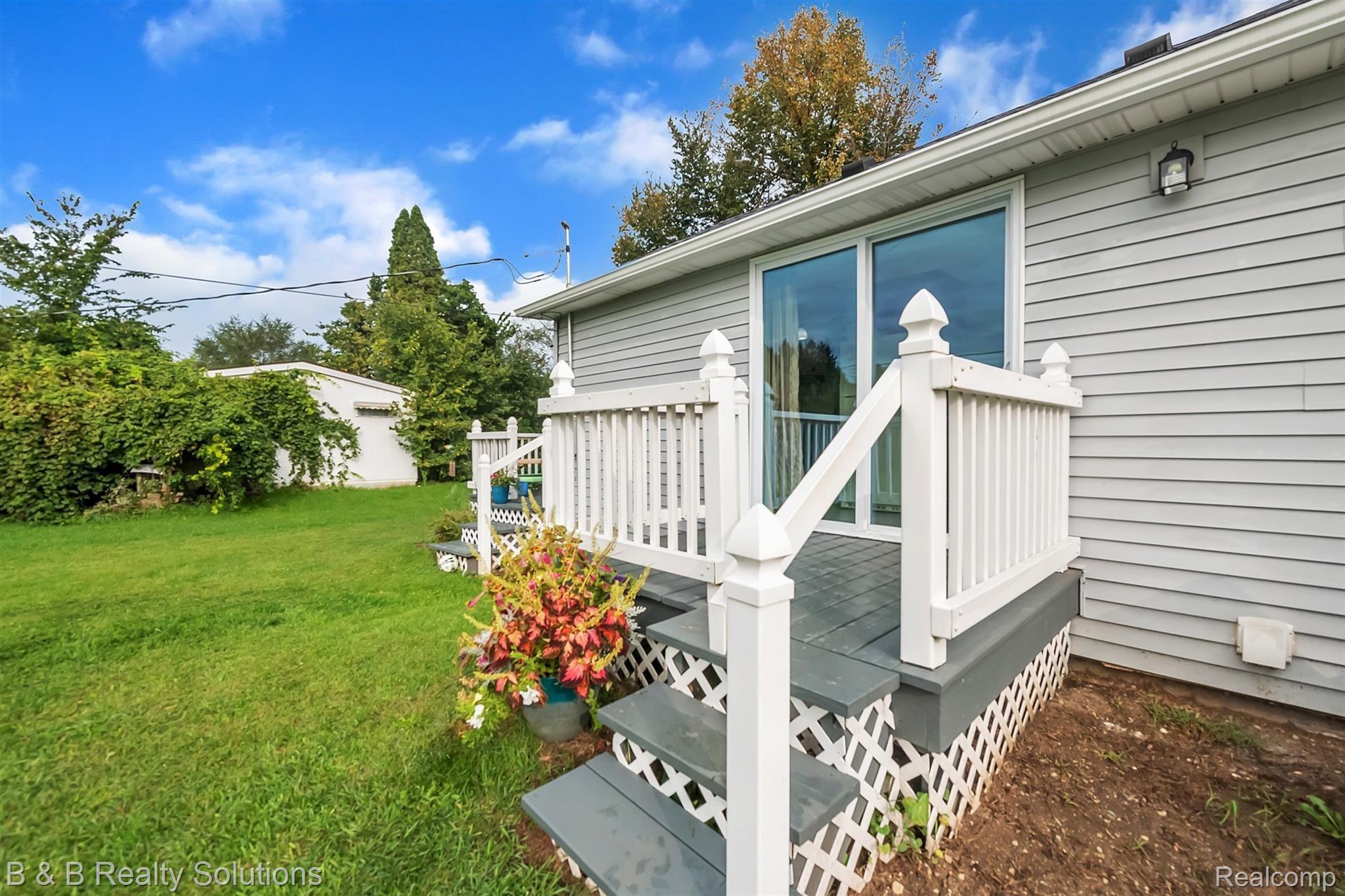 1115 Angle Road Lapeer, MI 48446 - Photo 32 of 39 33-1115 Angle Rd-WindowStill-Real-E.jpg