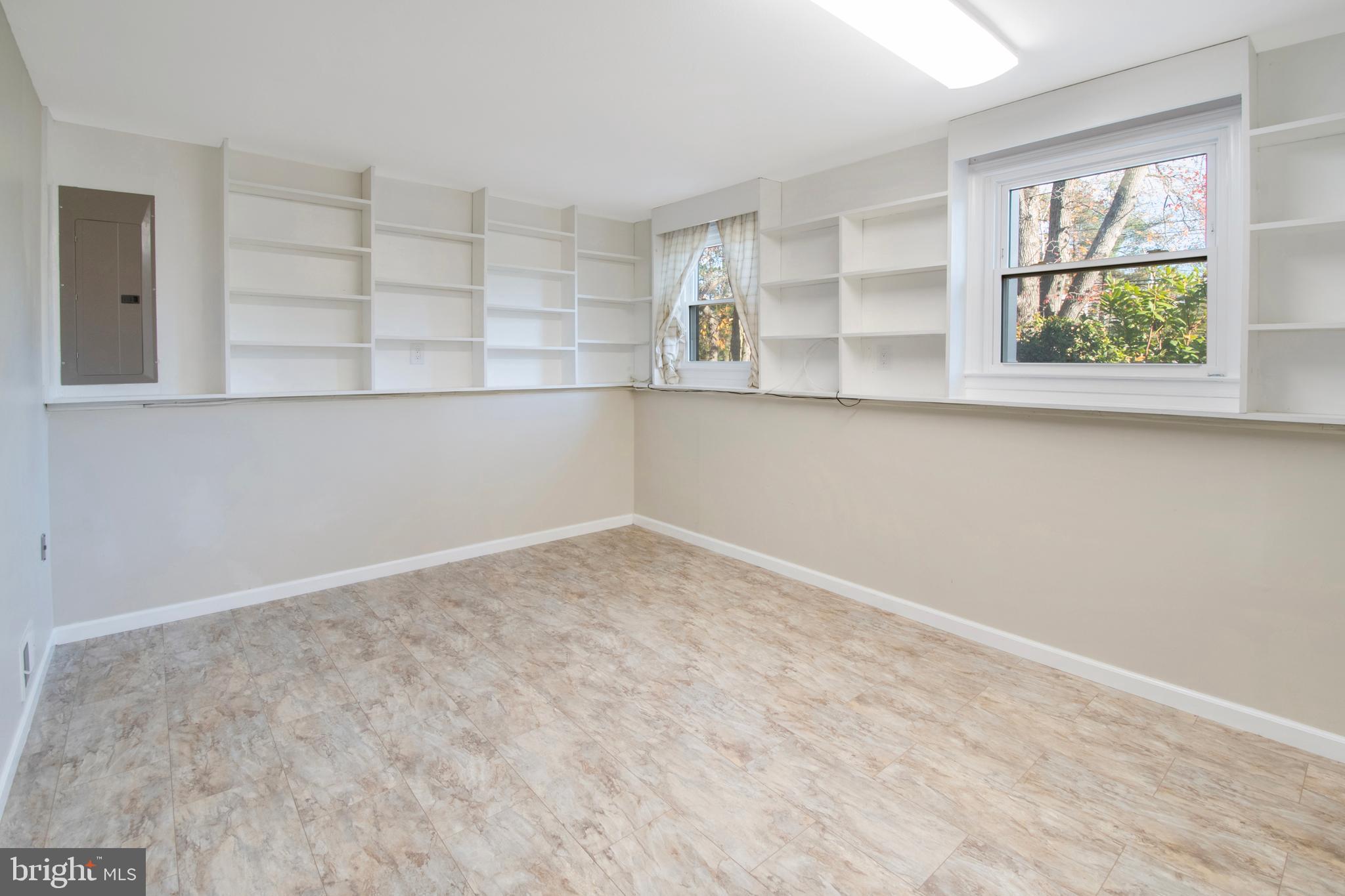 155 Franklin Corner Road Lawrence Township, NJ 08648 - Photo 16 of 29 an empty room with a window