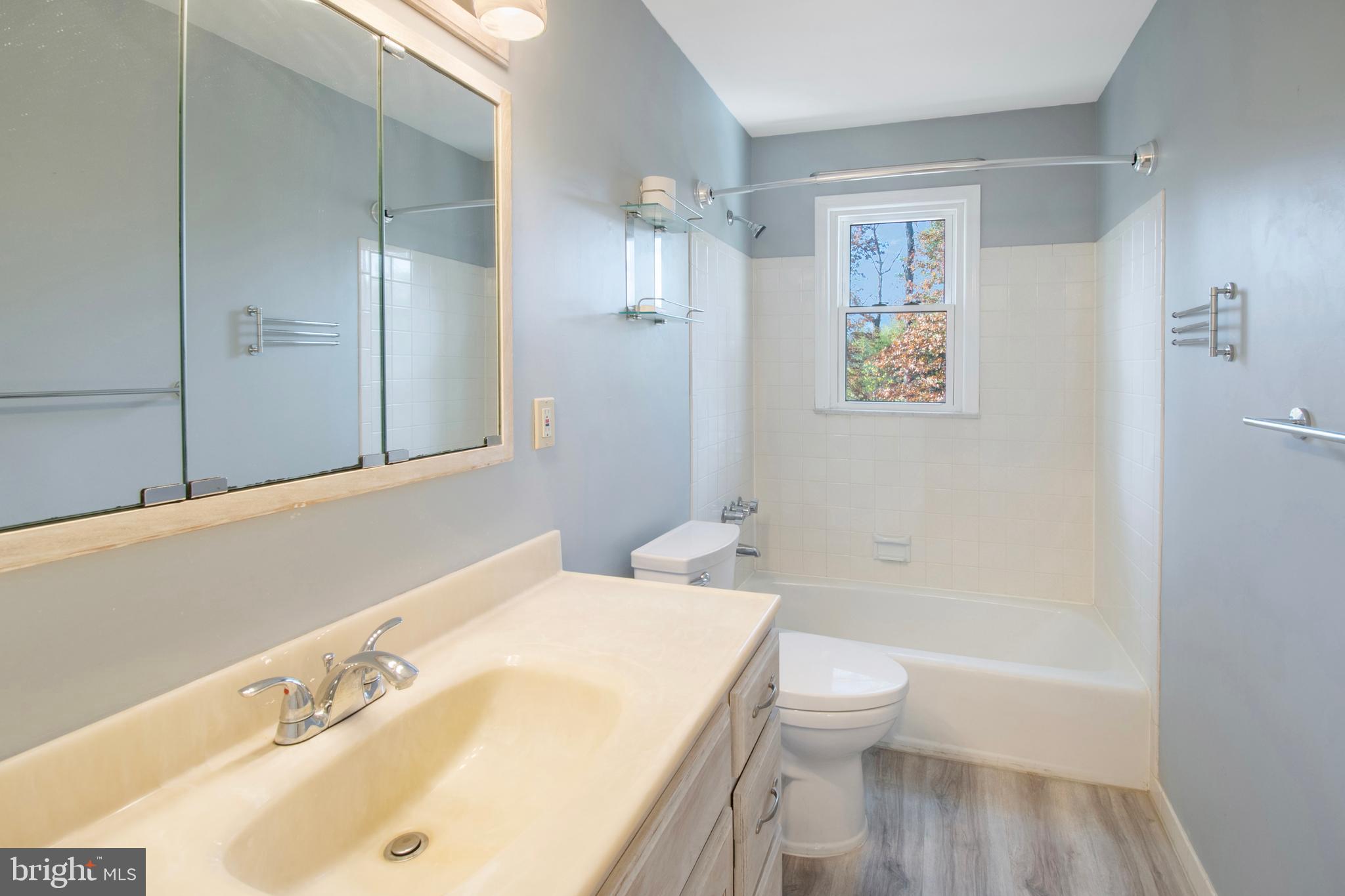 155 Franklin Corner Road Lawrence Township, NJ 08648 - Photo 20 of 29 a bathroom with a sink a toilet and shower