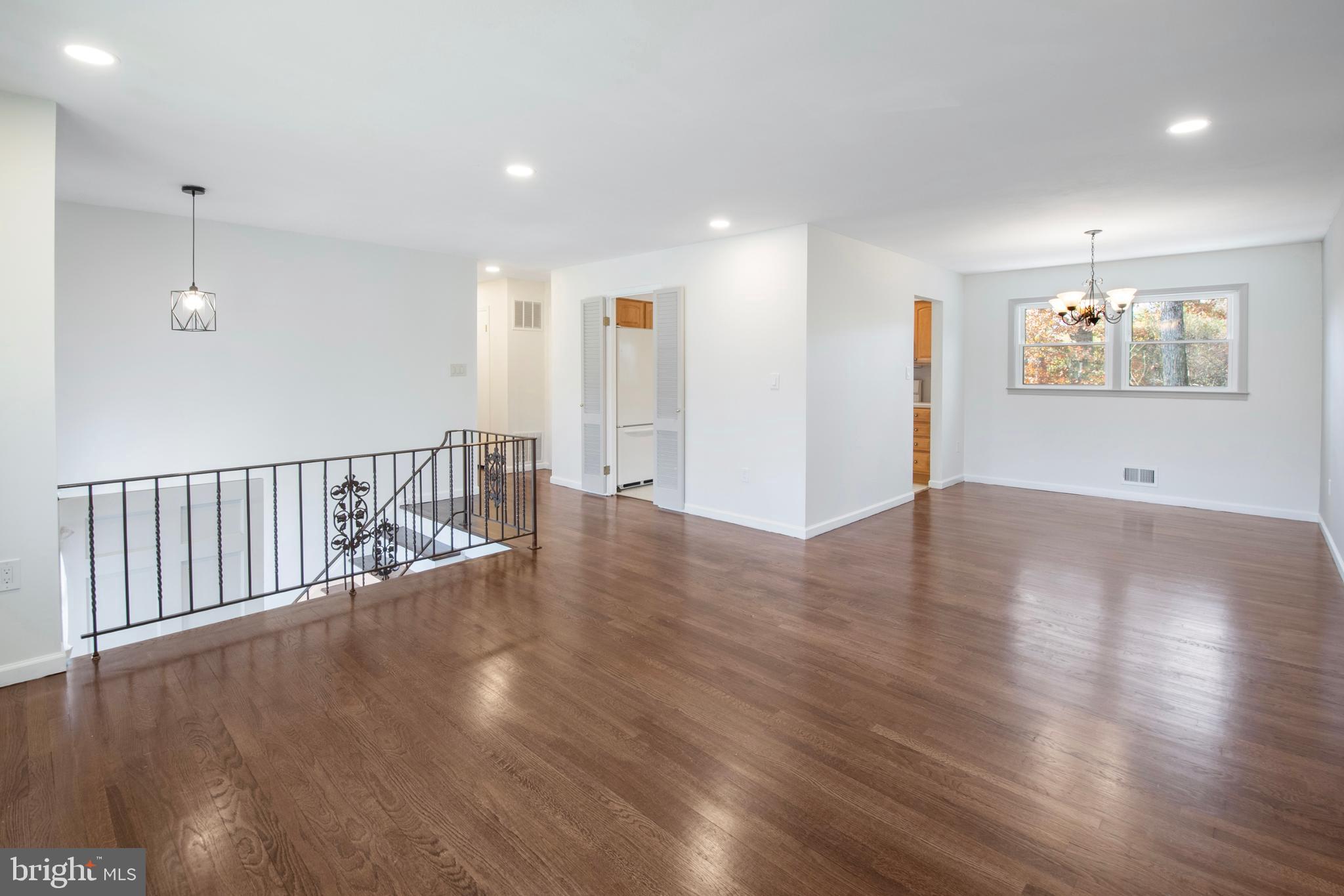 155 Franklin Corner Road Lawrence Township, NJ 08648 - Photo 2 of 29 a view of an empty room with wooden floor