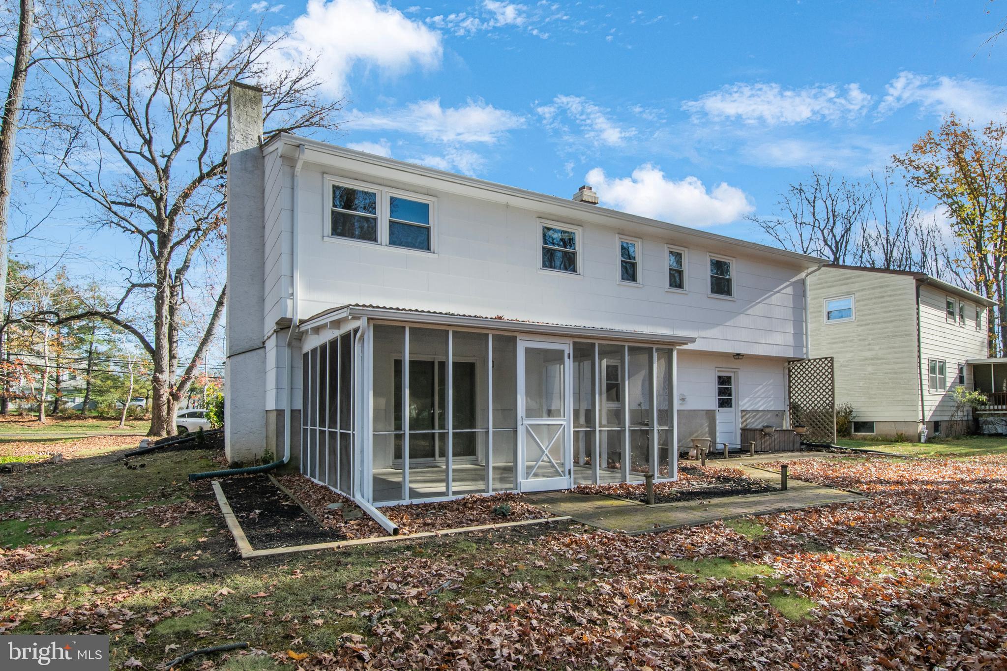 155 Franklin Corner Road Lawrence Township, NJ 08648 - Photo 28 of 29 a front view of a house with garden
