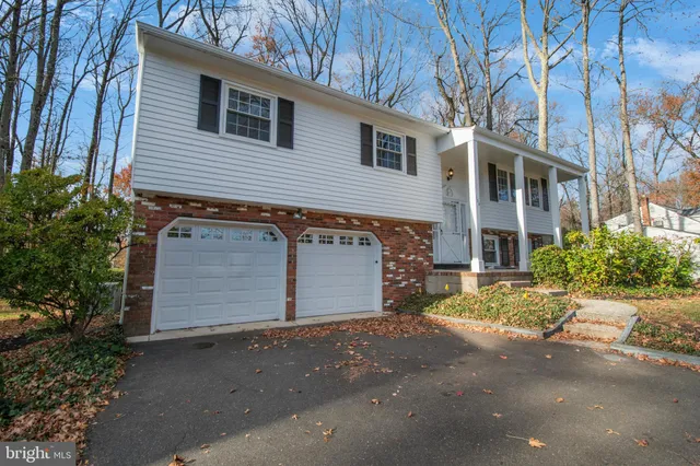 a view of a house with a street