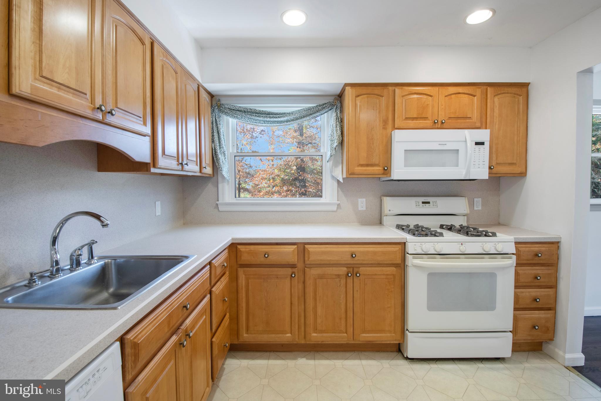 155 Franklin Corner Road Lawrence Township, NJ 08648 - Photo 8 of 29 a kitchen with appliances a sink and cabinets