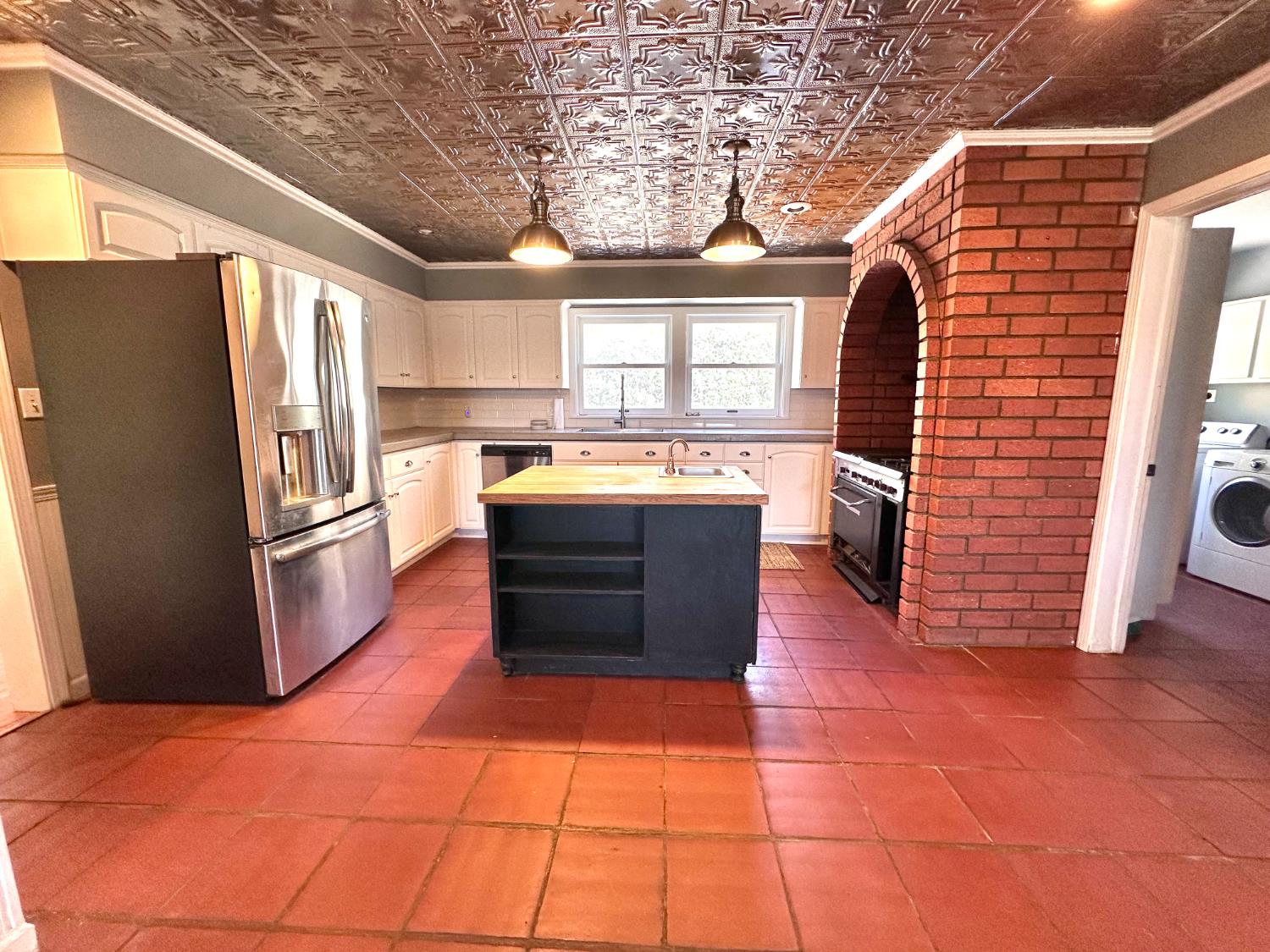 1933 Appaloosa Road Angels Camp, CA 95222 - Photo 19 of 75 a kitchen with stainless steel appliances granite countertop a sink stove and refrigerator