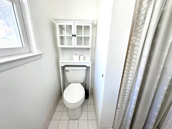 a view of a city street from a balcony