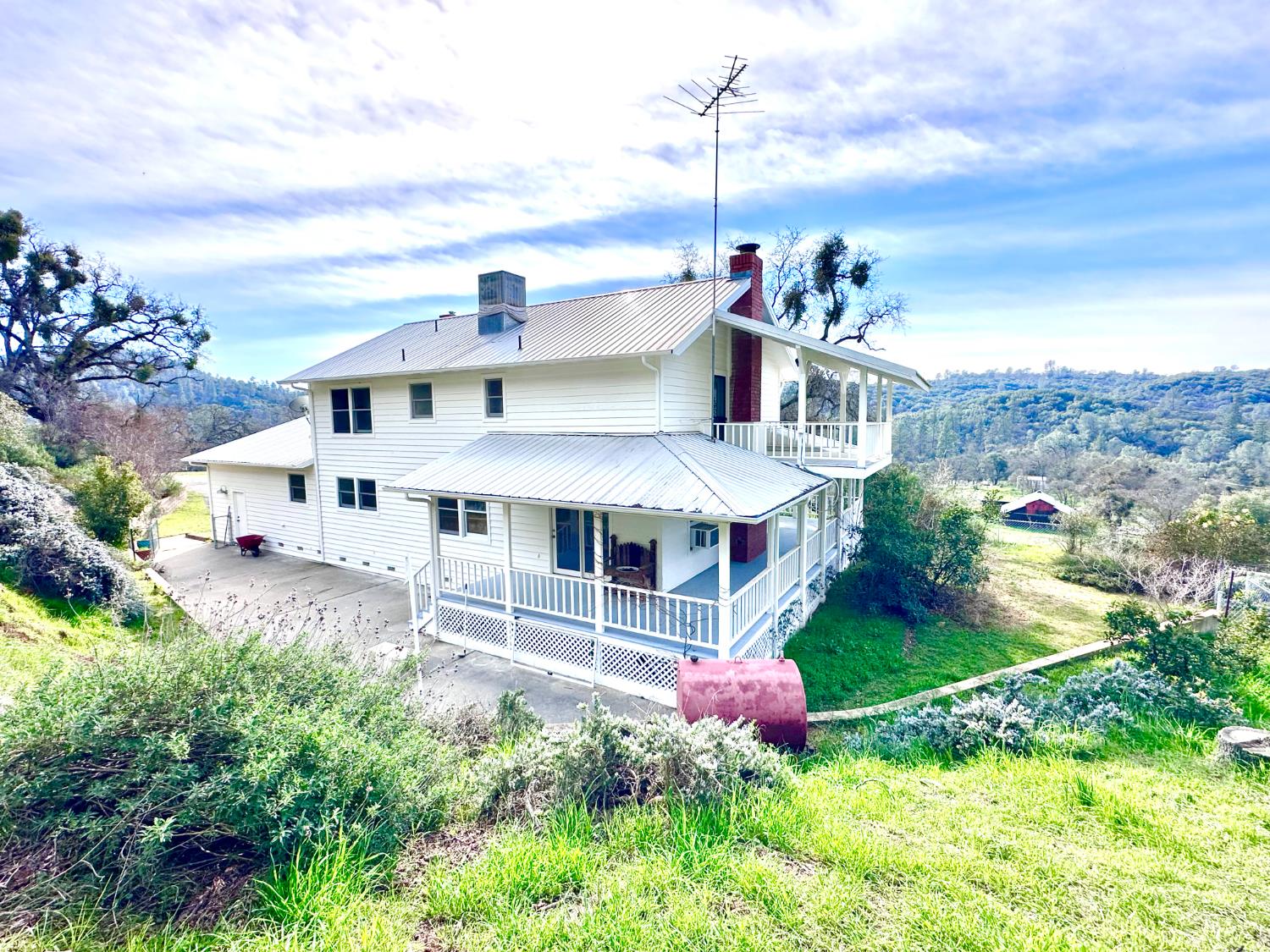 1933 Appaloosa Road Angels Camp, CA 95222 - Photo 40 of 75 a front view of a house with a garden and deck