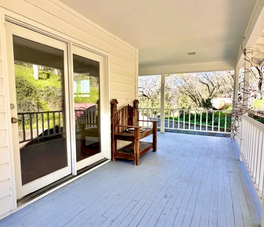 a view of a backyard with a tub