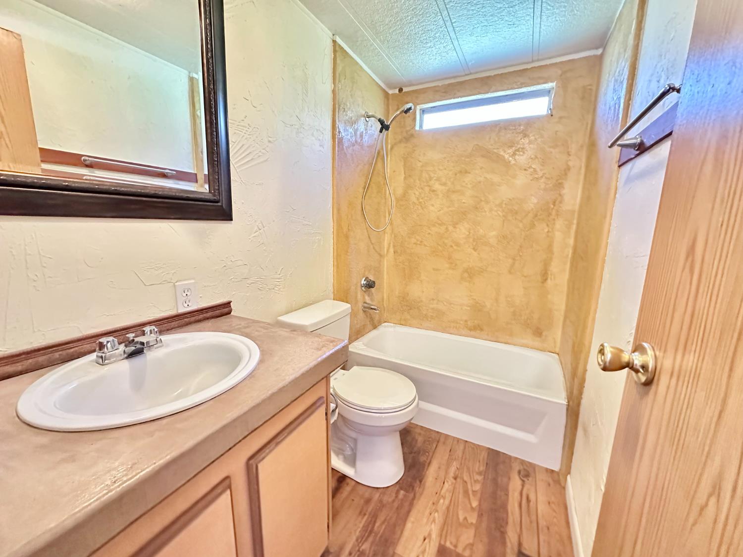 1933 Appaloosa Road Angels Camp, CA 95222 - Photo 63 of 75 a bathroom with a sink a toilet and a mirror