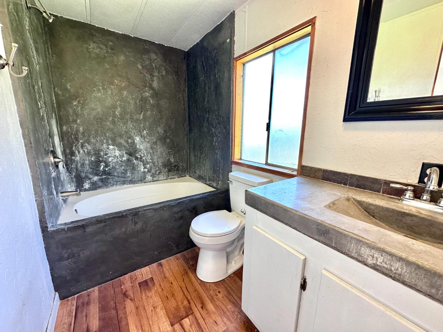 1933 Appaloosa Road Angels Camp, CA 95222 - Photo 68 of 75 a bathroom with a sink a toilet and a bathtub
