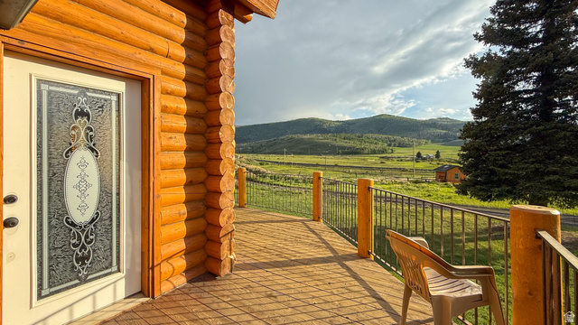 143 East Chestnut Street Helper, UT 84526 - Photo 15 of 35 Balcony featuring a deck with mountain view and a view of countryside