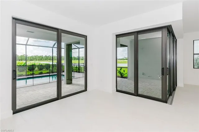 a view of an empty room with window