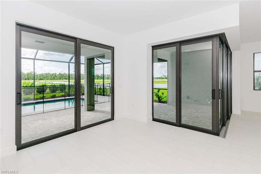 1954 Fresno Avenue Naples, FL 34120 - Photo 12 of 40 a view of an empty room with window