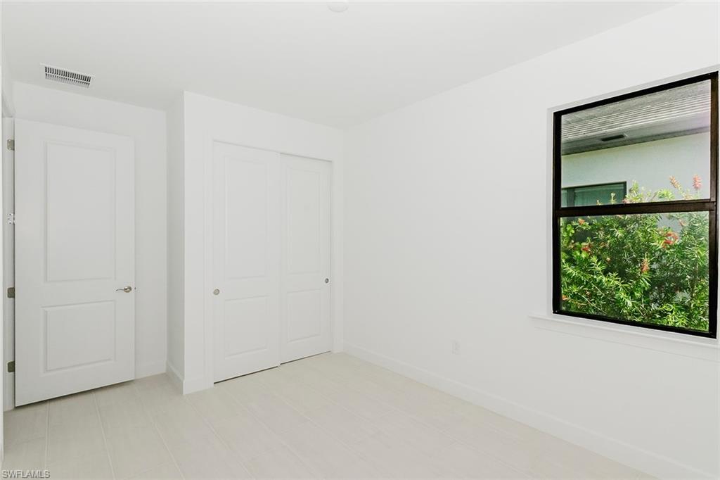 1954 Fresno Avenue Naples, FL 34120 - Photo 17 of 40 a view of an empty room