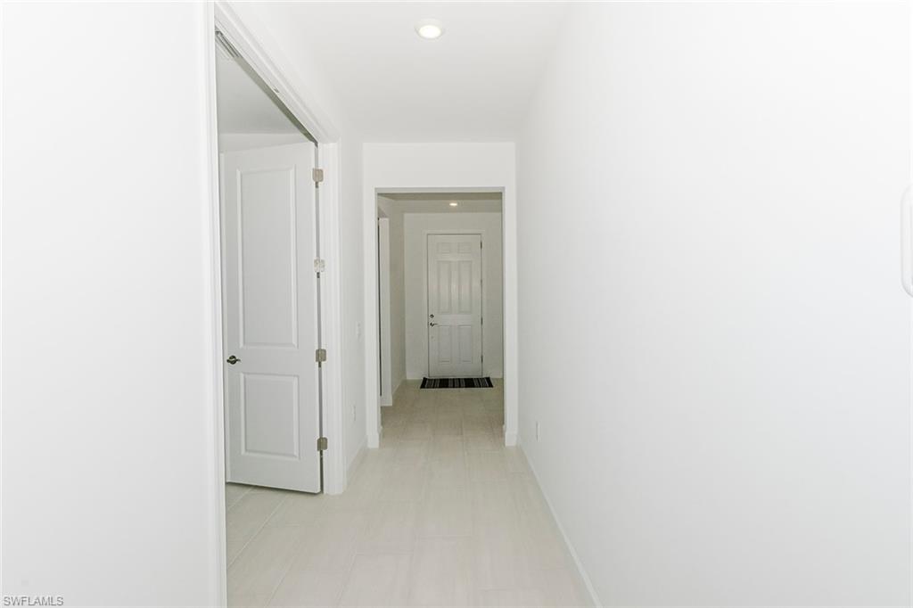 1954 Fresno Avenue Naples, FL 34120 - Photo 23 of 40 a view of an empty room