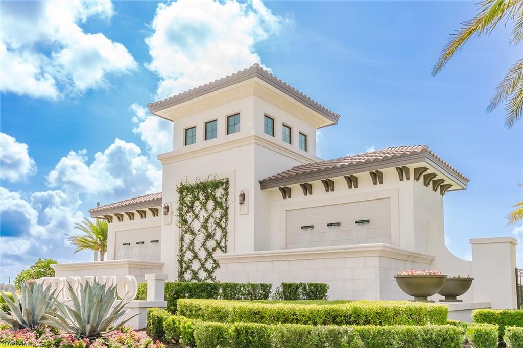 1954 Fresno Avenue Naples, FL 34120 - Photo 3 of 40 a front view of a house with garden
