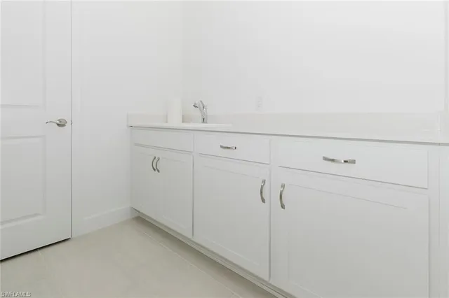 a view of bedroom and hallway