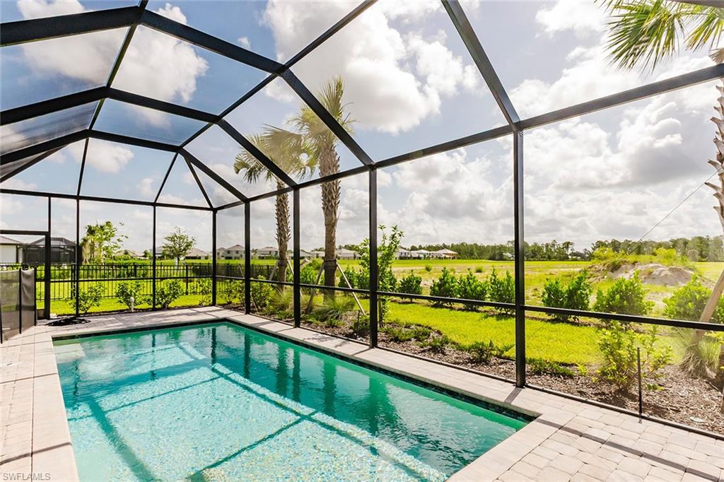 1954 Fresno Avenue Naples, FL 34120 - Photo 8 of 40 a view of a balcony with city view