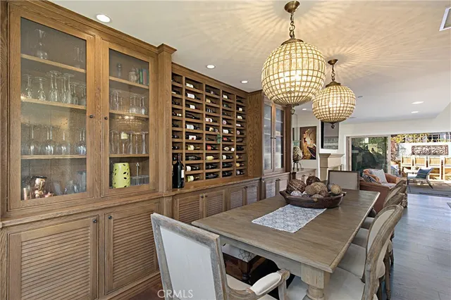 a view of a dining room with furniture window and chandelier