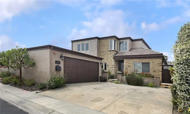 a view of a patio with table and chairs with potted plants
