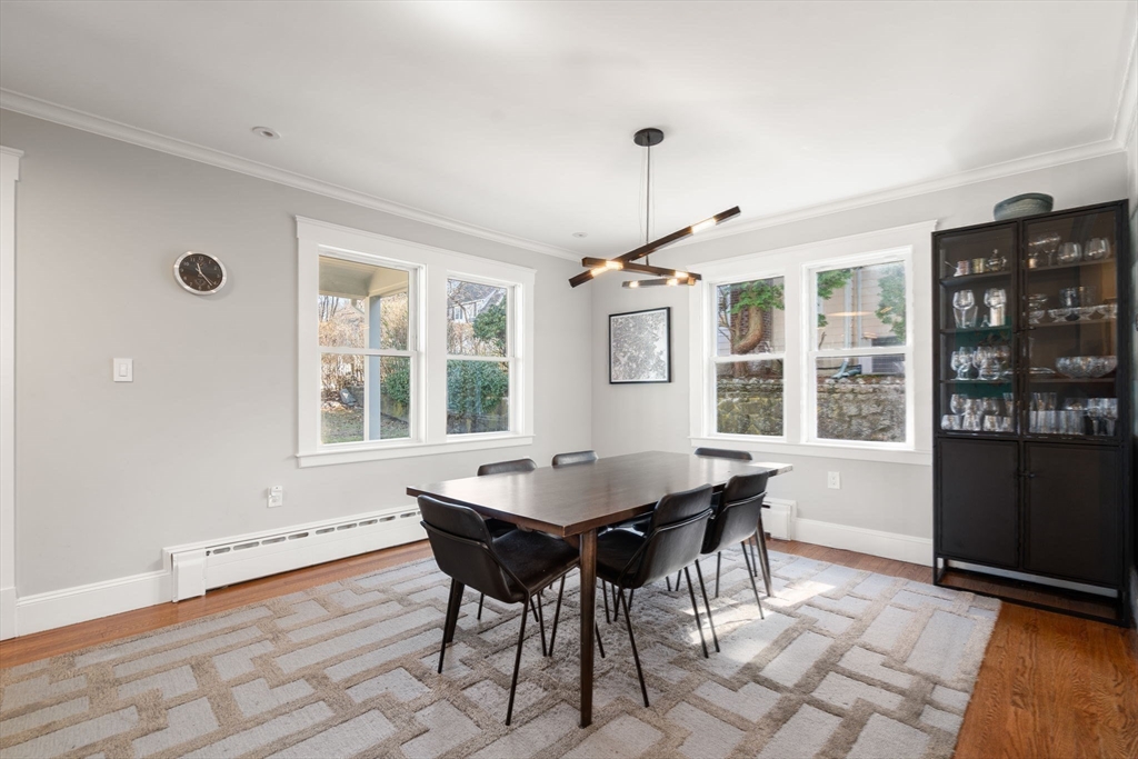 89 Prospect Street Newton, MA 02465 - Photo 13 of 31 a view of a dining room with furniture and window