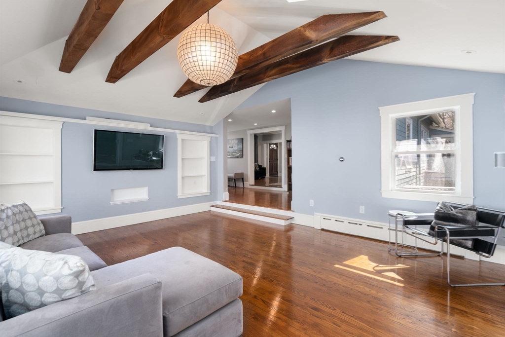 89 Prospect Street Newton, MA 02465 - Photo 17 of 31 a living room with furniture and a flat screen tv