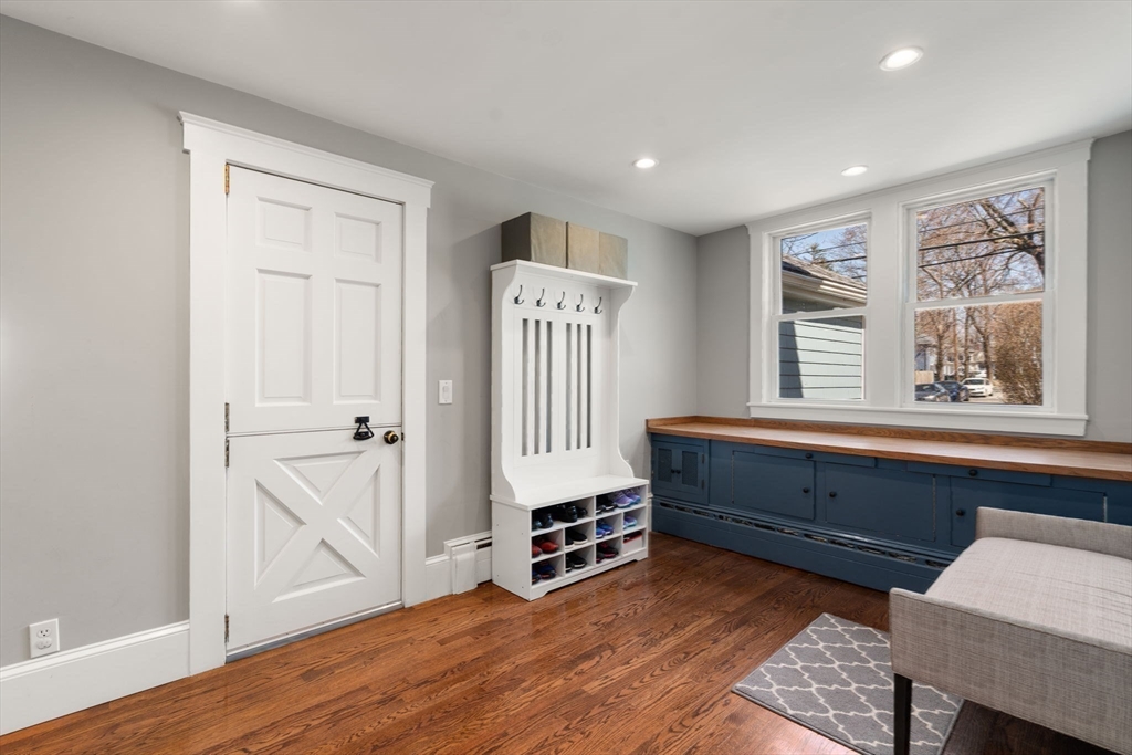 89 Prospect Street Newton, MA 02465 - Photo 19 of 31 a bedroom with furniture and a window