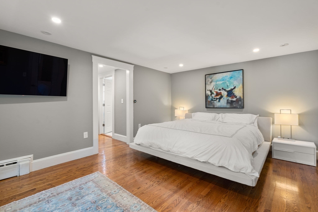 89 Prospect Street Newton, MA 02465 - Photo 21 of 31 a large white bed in a white room