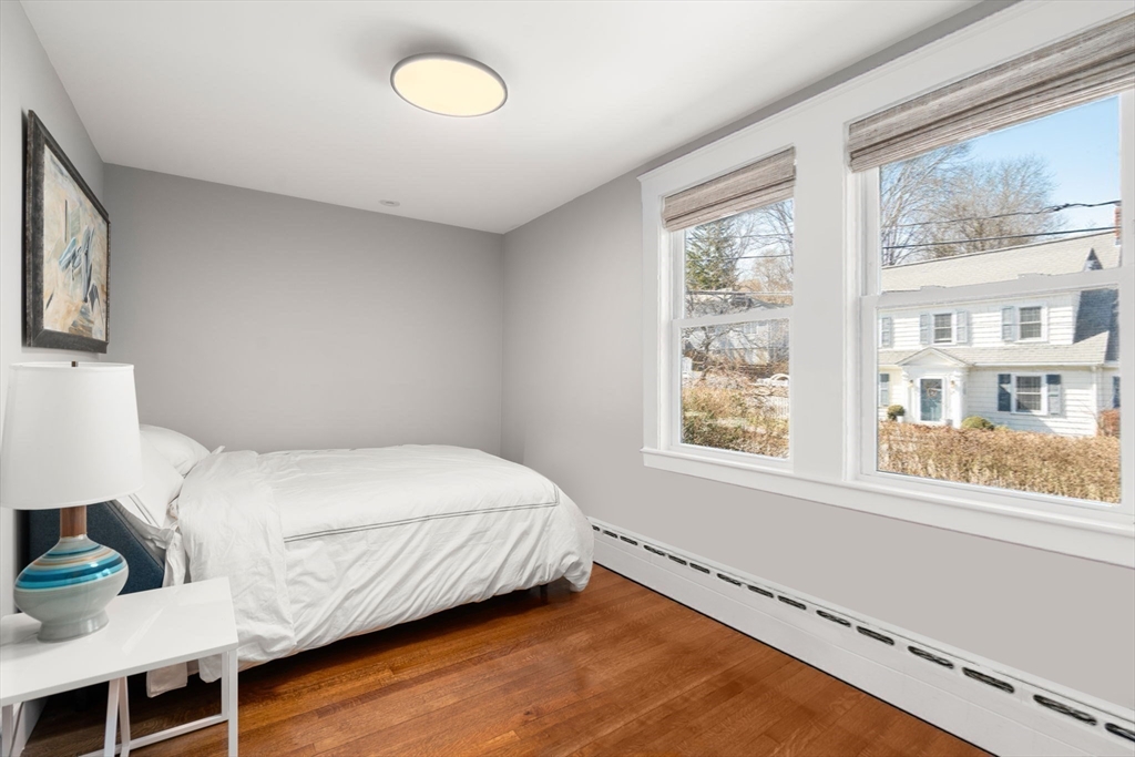 89 Prospect Street Newton, MA 02465 - Photo 23 of 31 a bedroom with a bed and window