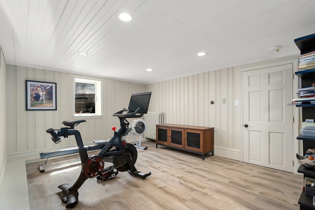 89 Prospect Street Newton, MA 02465 - Photo 28 of 31 a view of a livingroom with workspace and a window