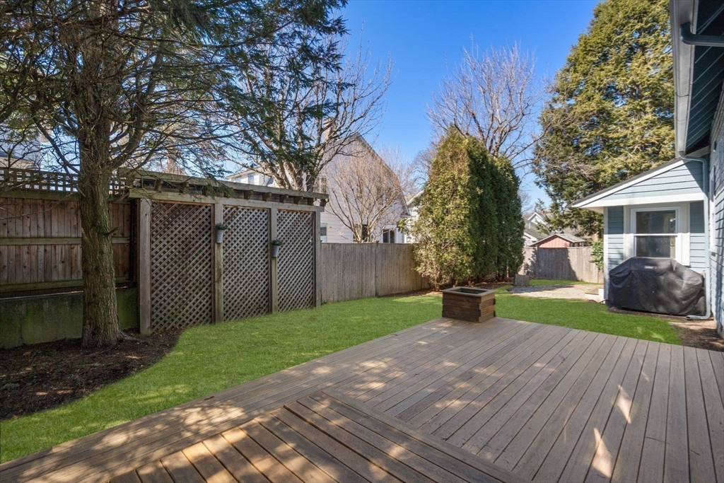 89 Prospect Street Newton, MA 02465 - Photo 30 of 31 a view of a house with a yard