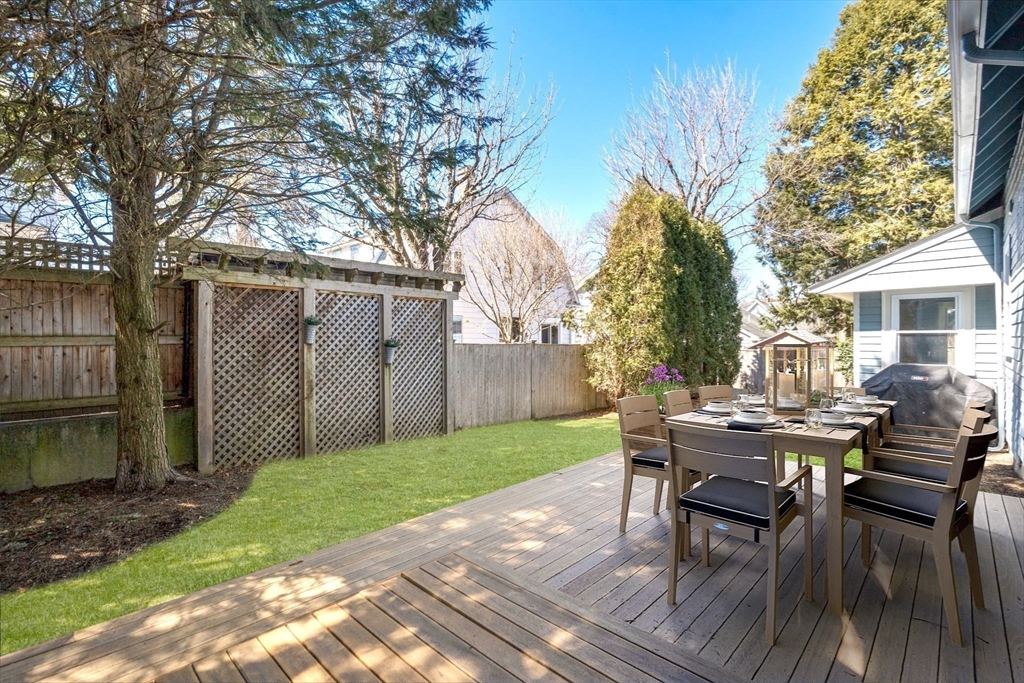 89 Prospect Street Newton, MA 02465 - Photo 3 of 31 a view of a house with backyard and wooden