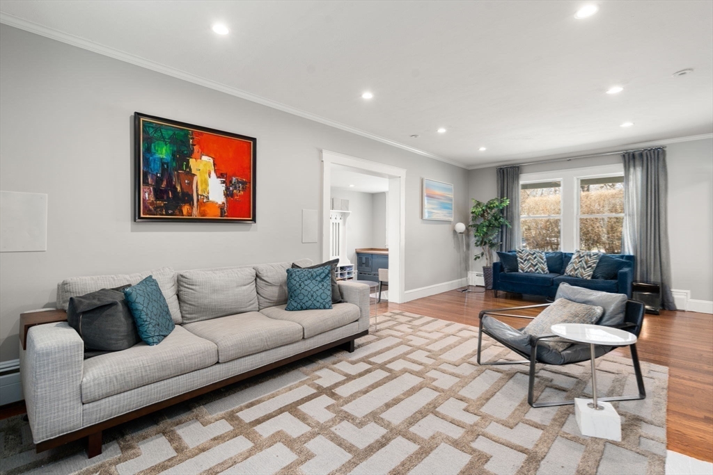 89 Prospect Street Newton, MA 02465 - Photo 5 of 31 a living room with furniture and a flat screen tv