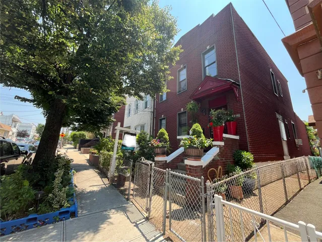 a view of street from balcony