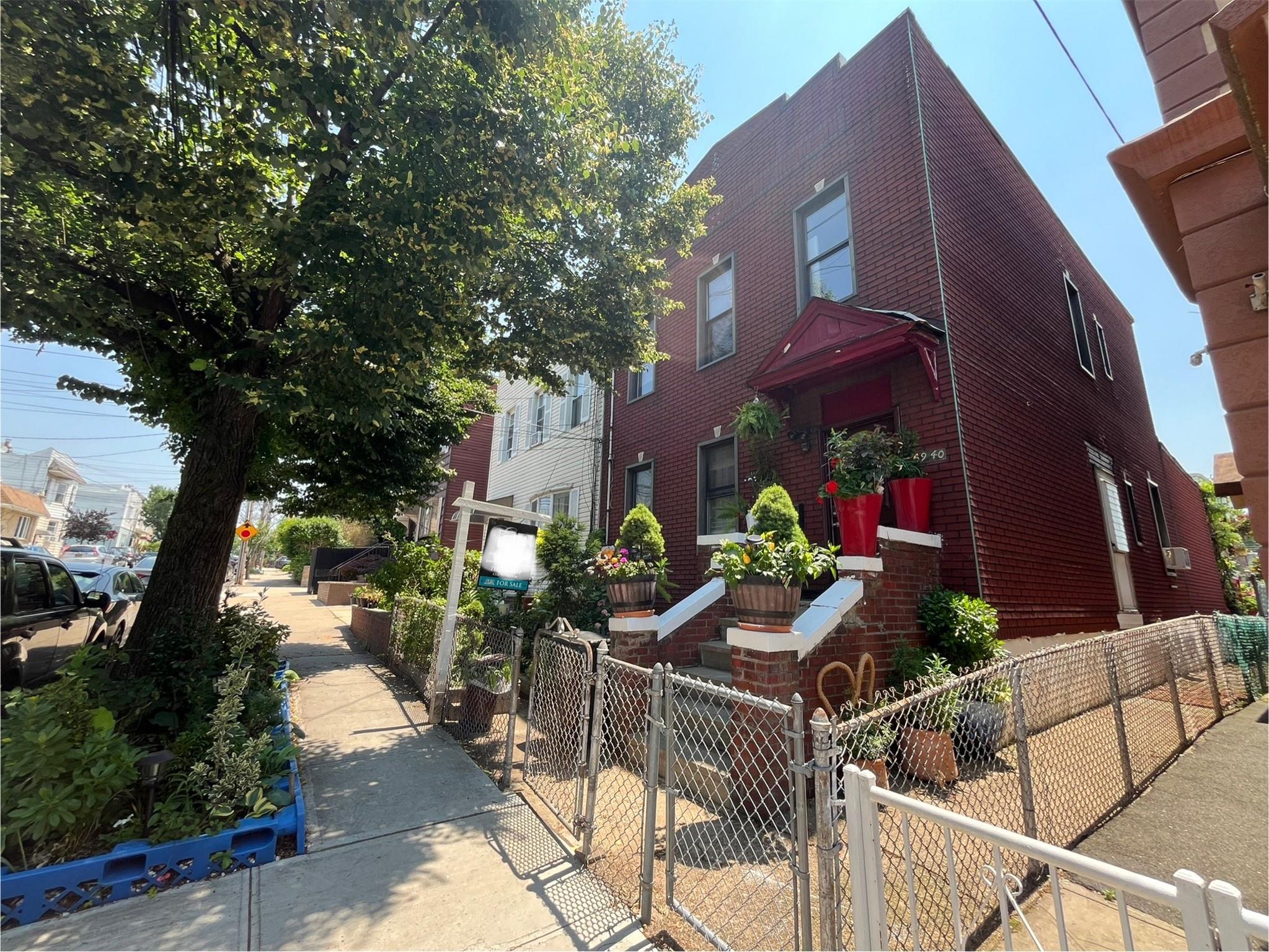 a view of street from balcony