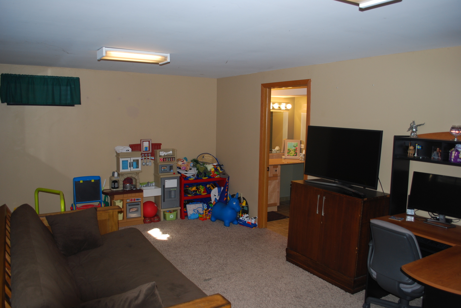 306 Circlegate Road, Unit 306 New Lenox, IL 60451 - Photo 8 of 15 a living room with furniture and a flat screen tv