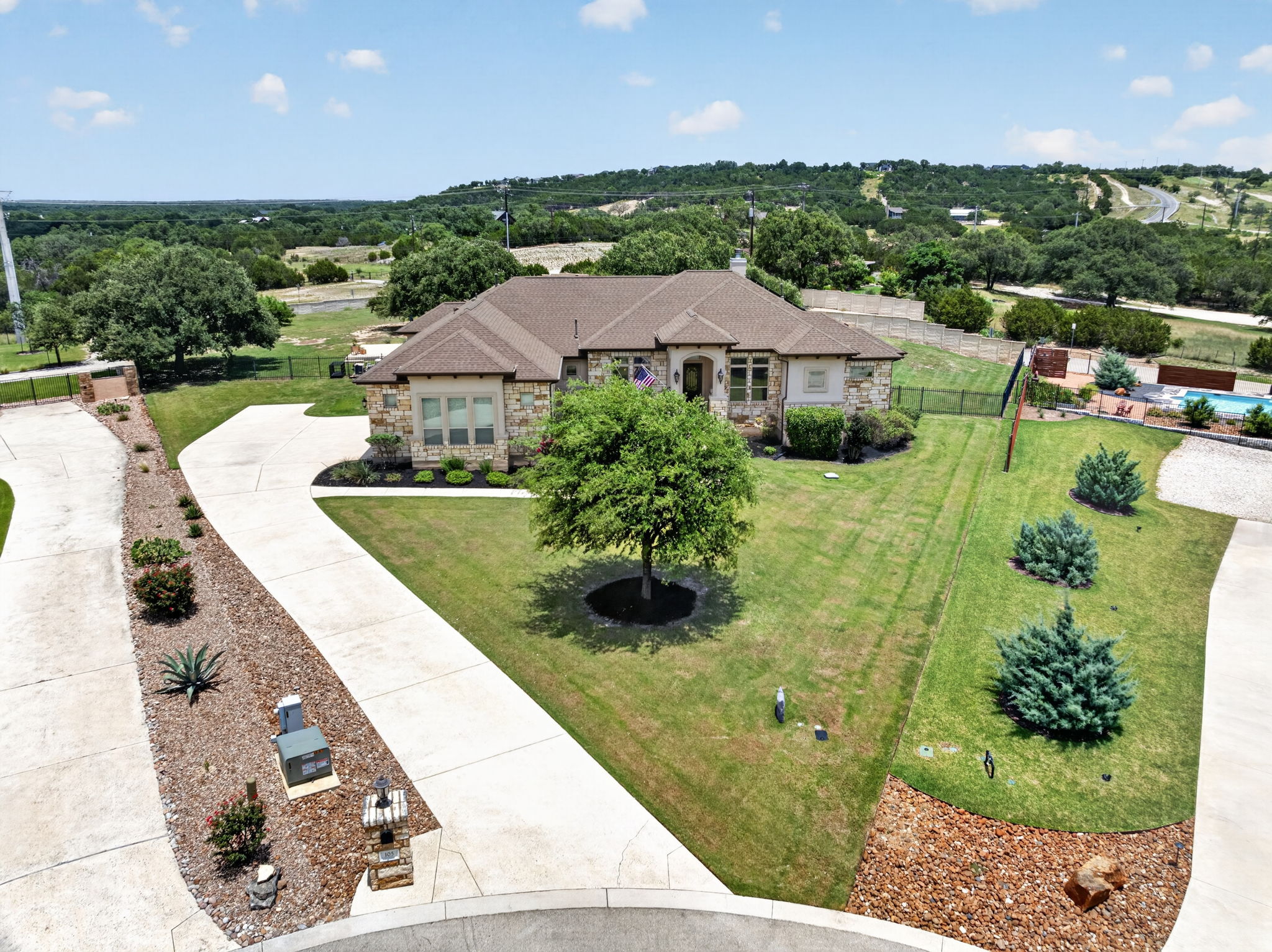 105 Coopers Hill Road Georgetown, TX 78633 - Photo 6 of 40 a view of a garden with a lake view
