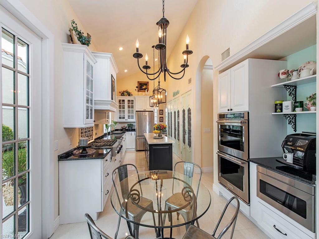 a view of a kitchen and dining room