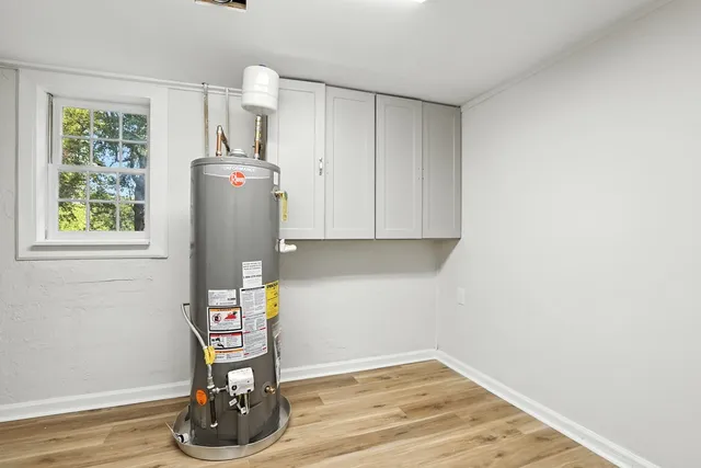 a view of workspace with wooden floor washer and dryer