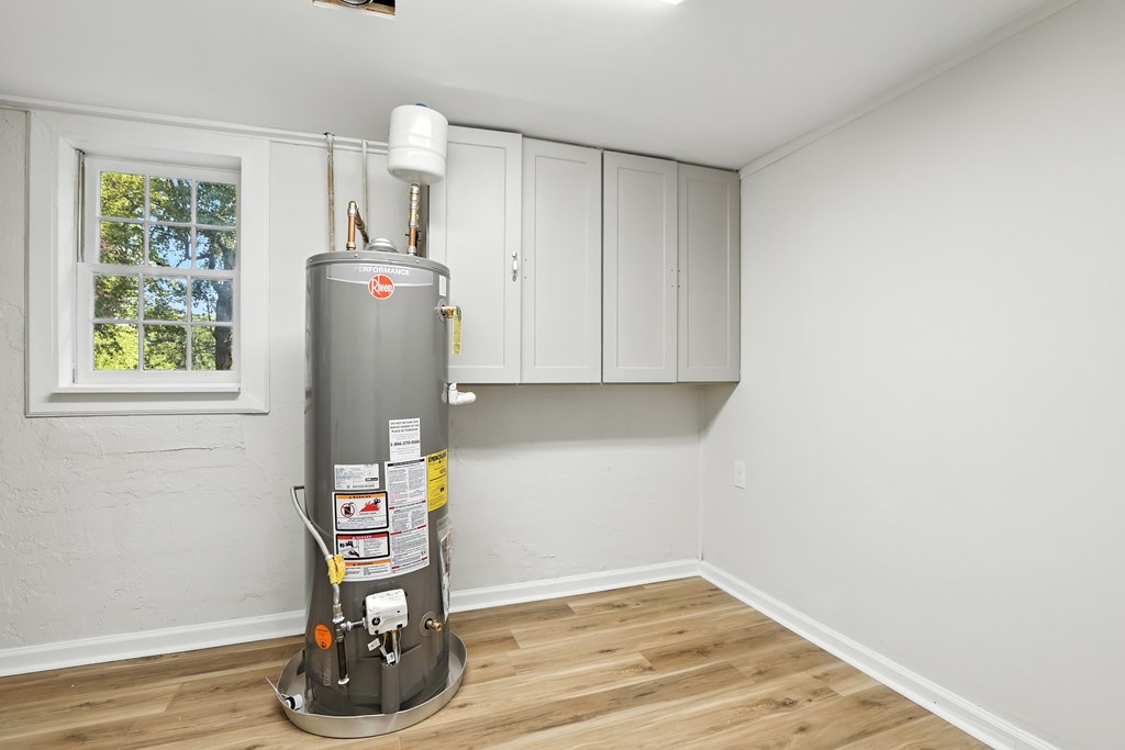 4627 Wimbish Court Columbus, GA 31909 - Photo 12 of 33 a view of workspace with wooden floor washer and dryer