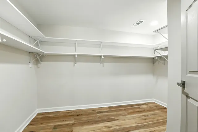 a view of a room with racks on the wall