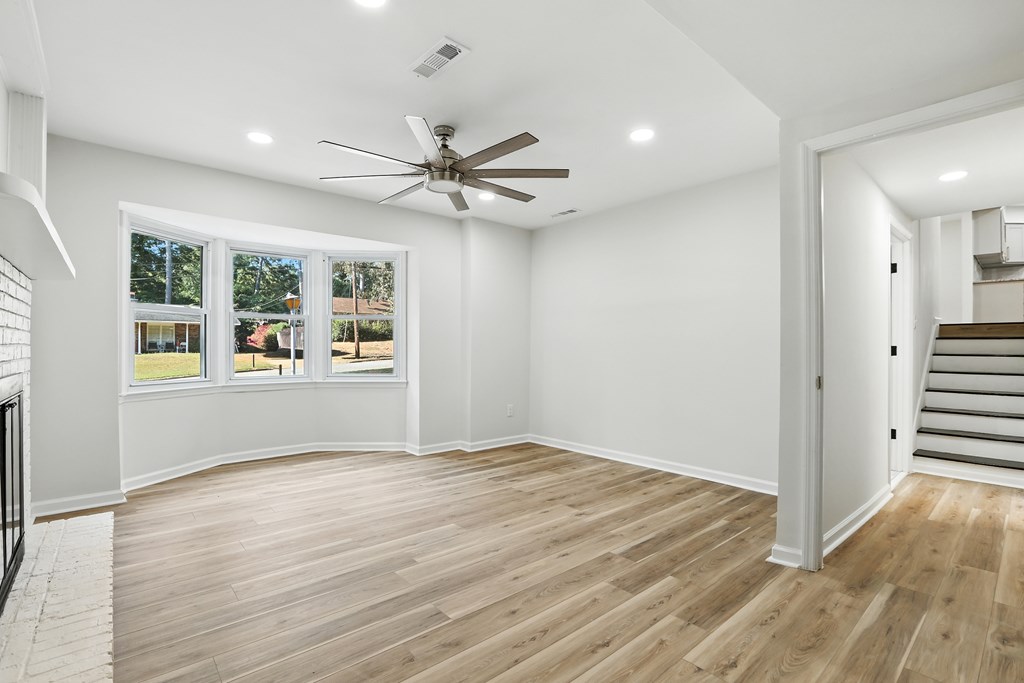 4627 Wimbish Court Columbus, GA 31909 - Photo 16 of 33 wooden floor in an empty room with a window