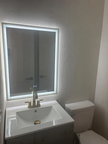 a bathroom with a sink and a toilet