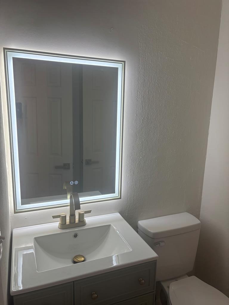 4627 Wimbish Court Columbus, GA 31909 - Photo 19 of 33 a bathroom with a sink and a toilet