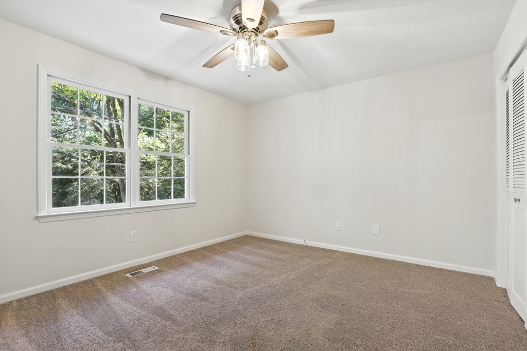 4627 Wimbish Court Columbus, GA 31909 - Photo 21 of 33 an empty room with windows and fan